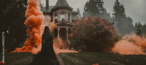 abandoned Victorian mansion with orange smoke coming out the chimney, in front stands a ghostly widow woman wearing a vintage black dress and veil, she is facing away from the camera, pumpkins, spooky