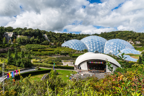 Eden Project, Cornwall, England ? August 14, 2023: visitor attraction and educational centre with huge greenhouses, one featuring rainforest climate and plants.