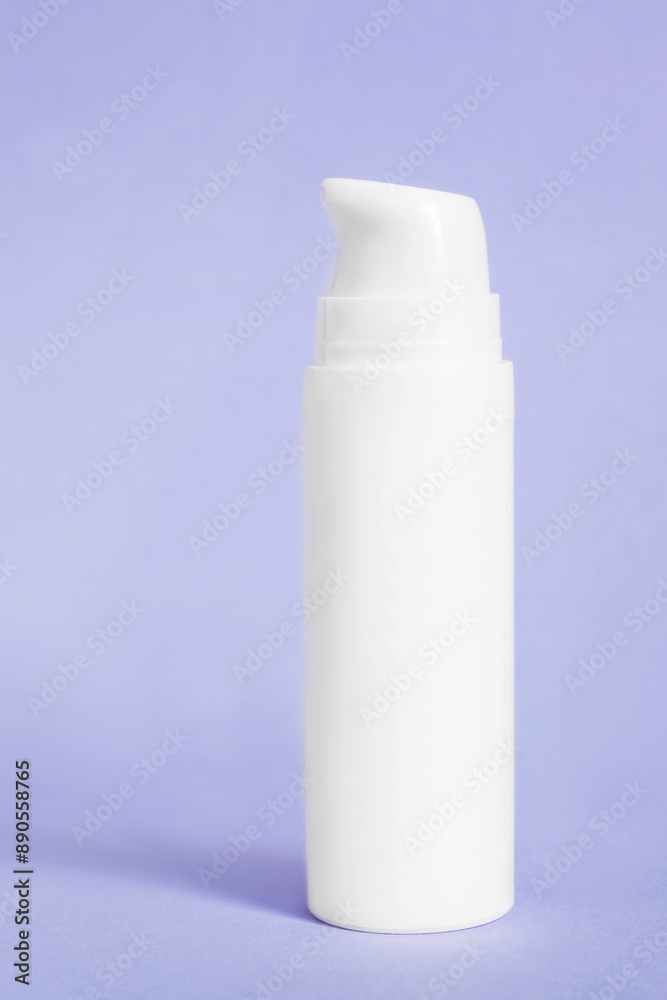 Pump bottle on lavender background Pump bottle on lavender background