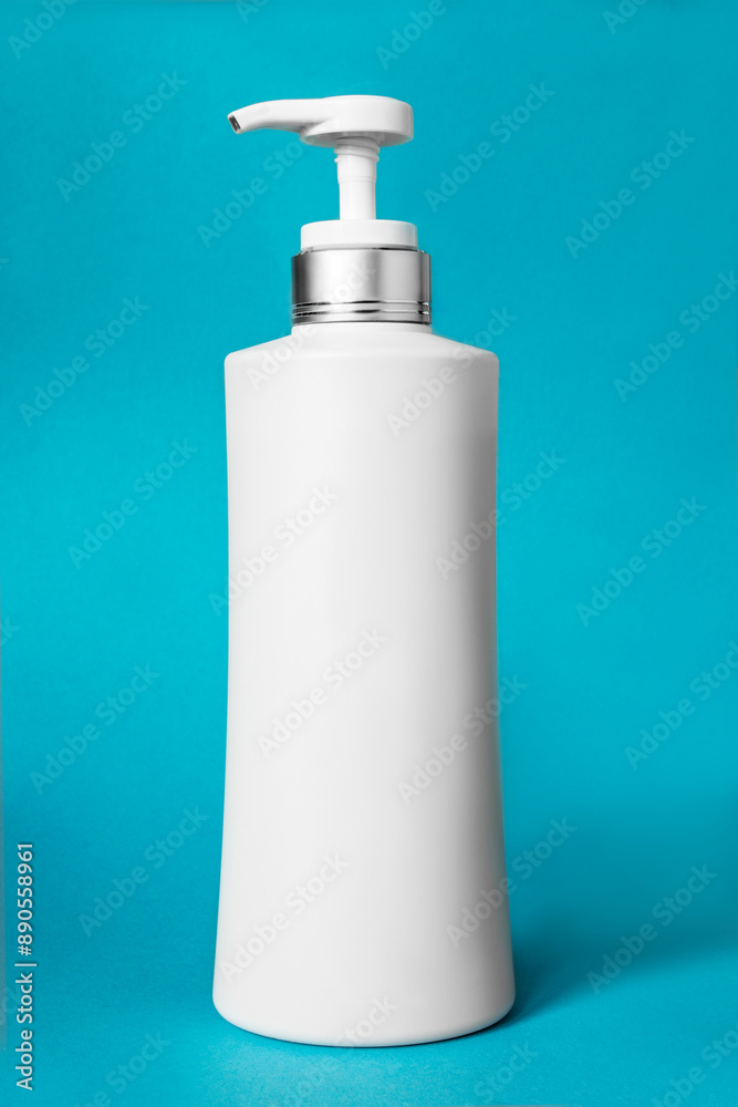 Pump bottle on blue background