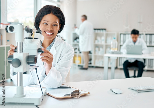 Scientist, portrait and woman with microscope in lab research notes, information and experiment results of study. Person, biotechnology and clipboard, medical and report of pharmaceutical test