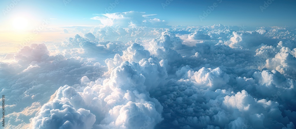 Naklejka premium Aerial View of Fluffy Clouds with a Bright Sky