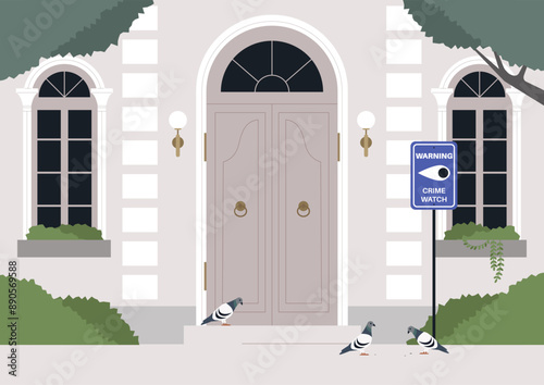 A white building with a large wooden door and windows, with a Crime Watch sign on the side, Pigeons gather on the sidewalk