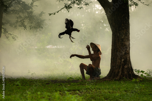 Countryside villagers practicing their cockfighting for competition