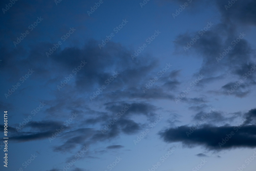 Obraz premium dark storm clouds on a blue sky background