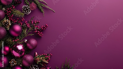 A cluster of purple Christmas ornaments, pine sprigs, and red berries are arranged on the left side of a magenta background photo