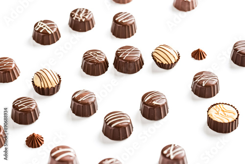Assorted Chocolate Truffles on White Background © Rysak