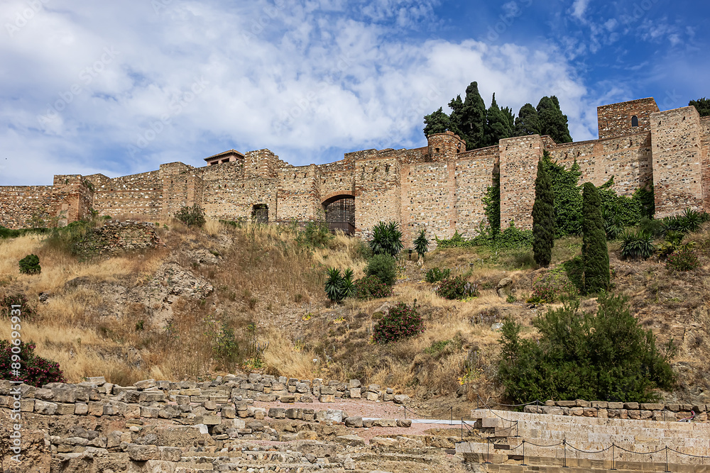 Ancient ruins of Roman Theater (El Teatro Romano) at foot of famous Malaga Alcazaba fortress, was built in the XI century. Malaga, Andalusia, Spain. Ancient ruins of Roman Theater (El Teatro Romano) at foot of famous Malaga Alcazaba fortress, was built in the XI century. Malaga, Andalusia, Spain.