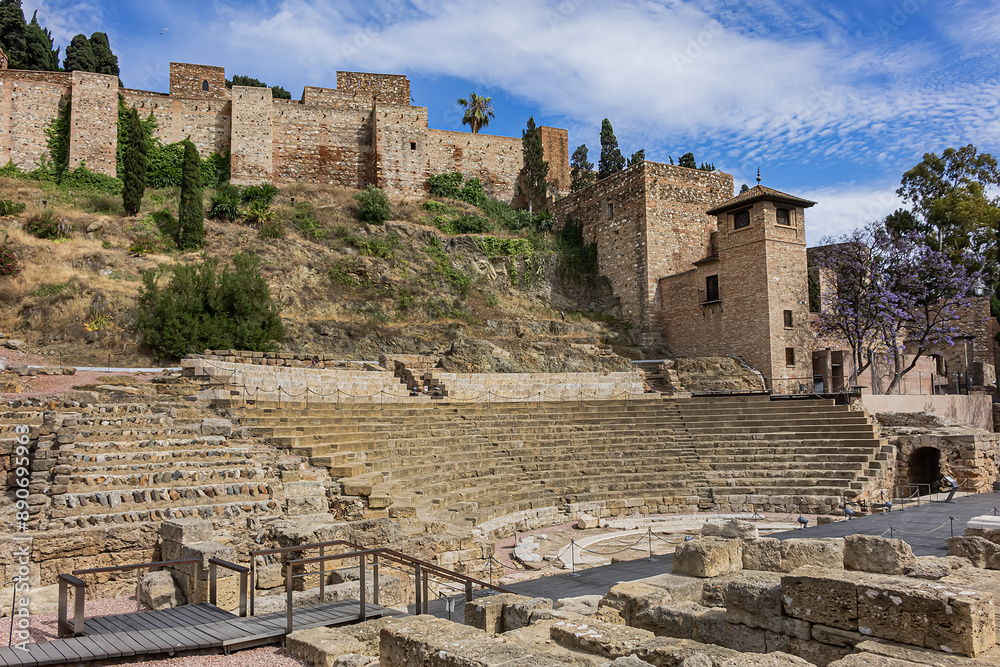 Ancient ruins of Roman Theater (El Teatro Romano) at foot of famous Malaga Alcazaba fortress, was built in the XI century. Malaga, Andalusia, Spain.