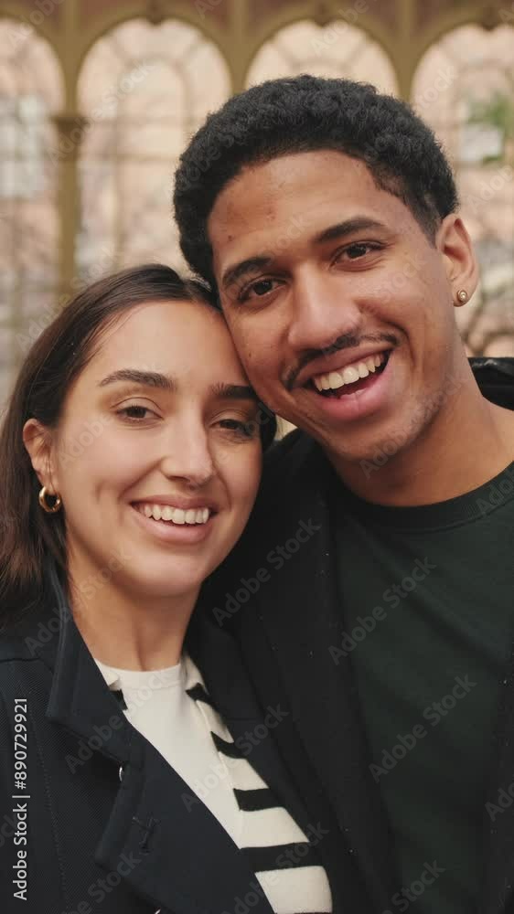 Happy young couple embracing in greenhouse. Happy young couple embracing in greenhouse.