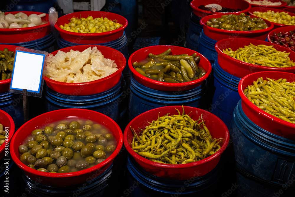 Fototapeta premium Different fruit and vegetable pickles at a farmers' market in Turkey.