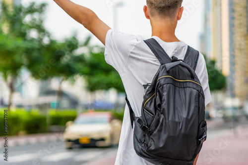 student catch taxicar. Hailing a taxi. Transport car. Get a ride photo