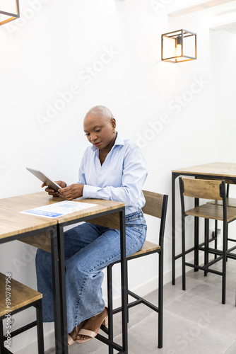 Wallpaper Mural Woman studying on a tablet in a modern classroom Torontodigital.ca