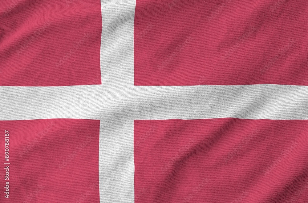 Denmark flag depicted on folded wavy fabric of old cloth close up Denmark flag depicted on folded wavy fabric of old cloth close up