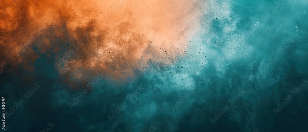 Obraz premium A dynamic abstract image featuring a blend of orange and teal smoke creating a captivating contrast.