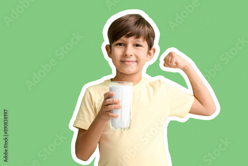 Little boy with glass of mi...