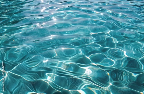 Closeup View of Rippling Blue Water in a Swimming Pool on a Sunny Day