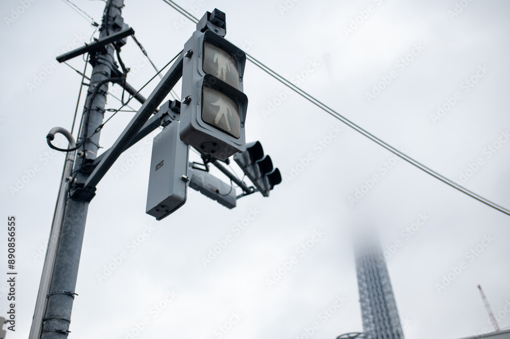 Pedestrian Traffic Light on a Cloudy Day Pedestrian Traffic Light on a Cloudy Day