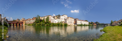 view to historic skyline of Bassano del Grappa with the Old wooden Bridge, also called ponte degli Alpini, Italy