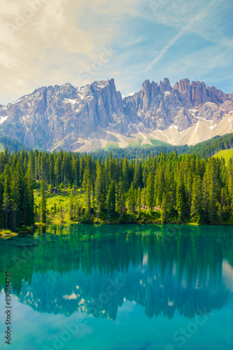 At Lake Braies in the morning on holiday in South Tyrol. A mountain in the Alps in the background