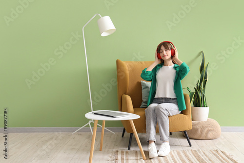 Young woman with headphones...