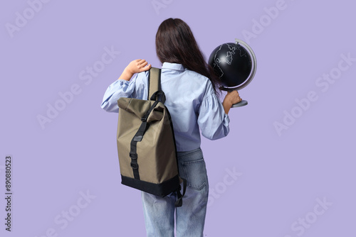 Young Asian woman with glob...