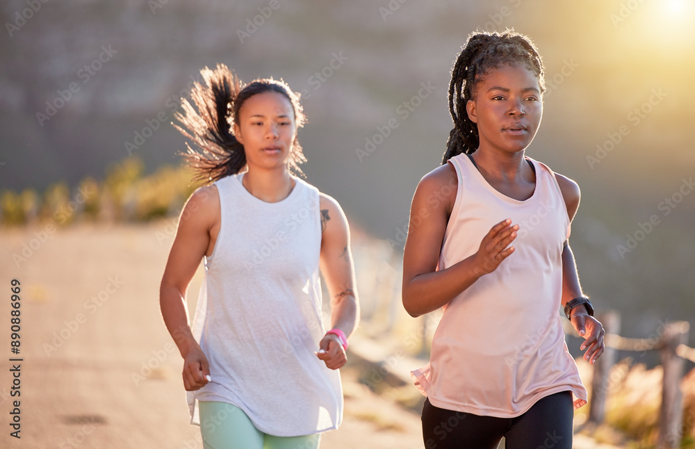 Woman, friends and running on mountain street, nature and cardio sport for fitness together. Marathon, training and wellness activity with athletic partner, friendship and race with energy for health Woman, friends and running on mountain street, nature and cardio sport for fitness together. Marathon, training and wellness activity with athletic partner, friendship and race with energy for health