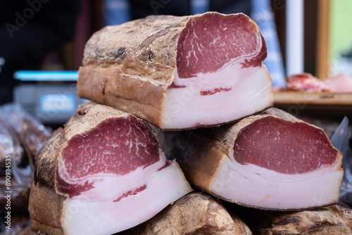 Pieces of salty high-fat meat in a shop. Salo or bacon. tasty meat. photo