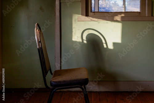 Old Chair inside an abandoned house in rural Victoria, Australia photo