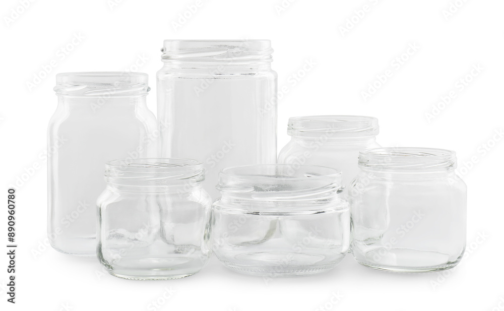 Many empty glass jars isolated on white