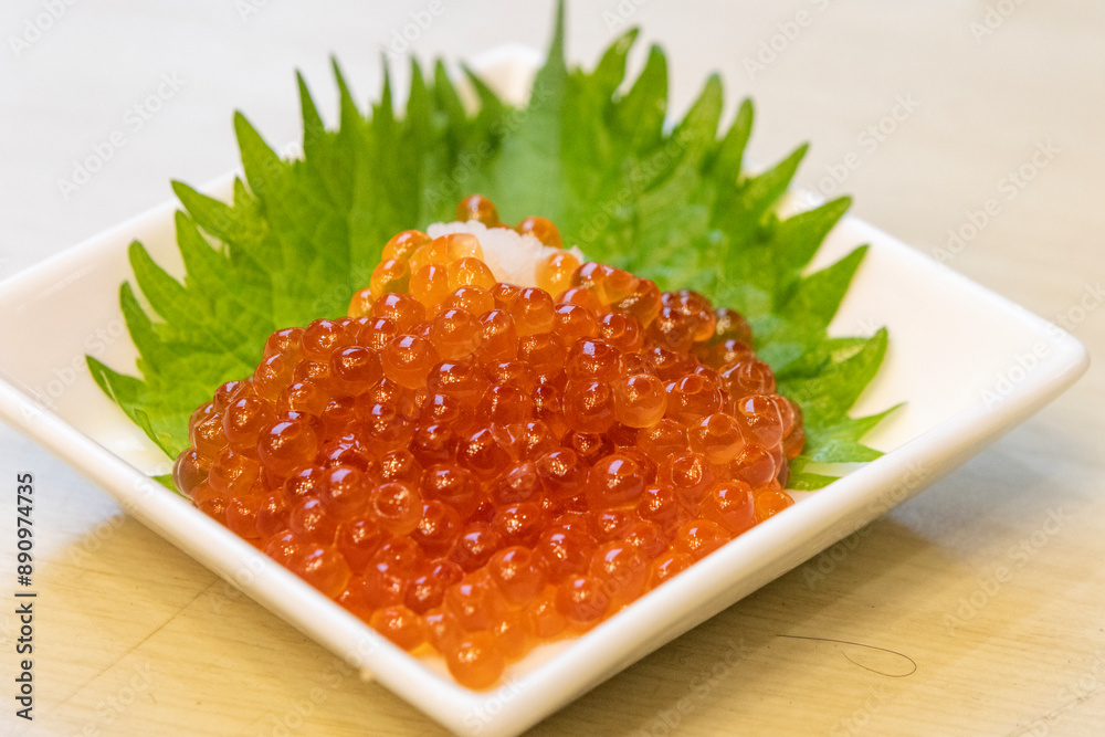 Bowl of fresh salmon roe. Bowl of fresh salmon roe.