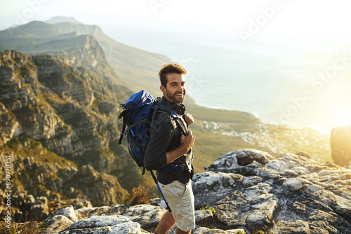 Canvas Print Man, mountain and backpacking for outdoor portrait, travel and hiking in nature for tourism journey