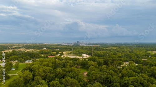 Aerial Motion Time Lapse Hyper Lapse Drone Boom Up over Suburbia onto City Skyline, New Albany, Indiana