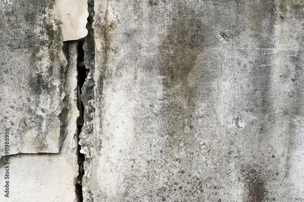 Obraz premium house broken. concrete crack. Water damage building interior. large crack white concrete wall