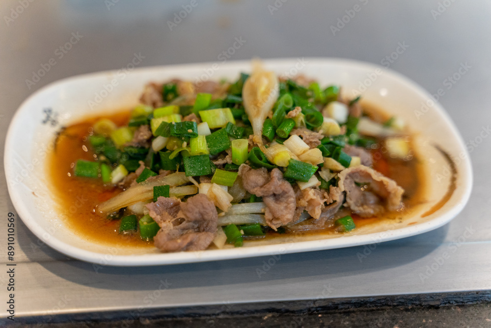 Enjoy delicious freshly prepared Teppanyaki pork slices Enjoy delicious freshly prepared Teppanyaki pork slices