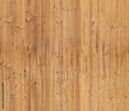 Brown wooden surface texture. The warm background can form a repeating seamless pattern of wood.