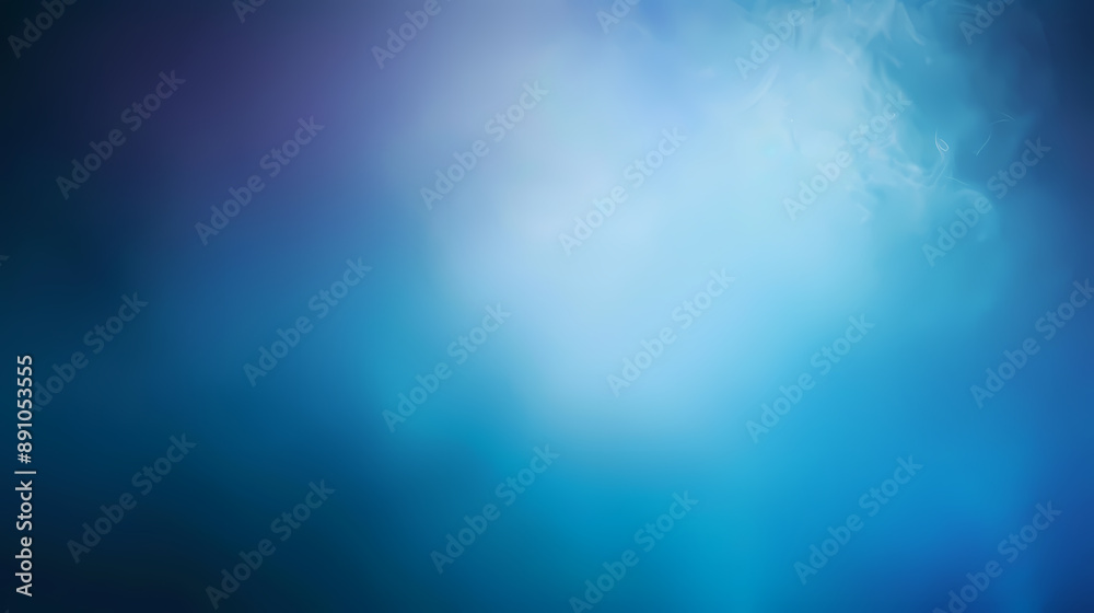 Fototapeta premium Abstract blue gradient background with soft lighting and smoky textures, perfect for digital designs.