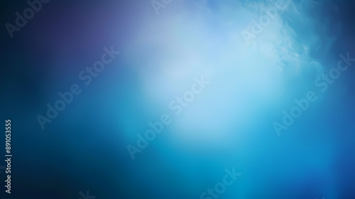 Abstract blue gradient background with soft lighting and smoky textures, perfect for digital designs.