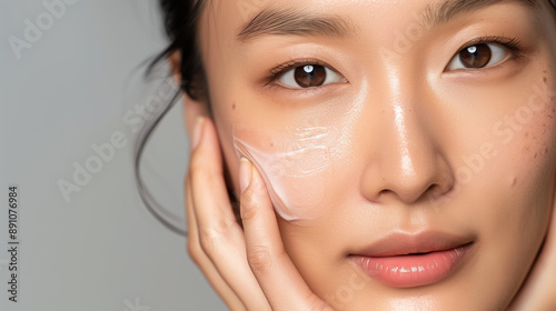 Effective Resorcinol Acne Cream Application on South Korean Woman's Face, Visible Clear Skin photo