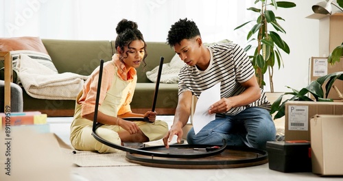 Foto Couple, people and assemble table with document for instructions and tips in new home