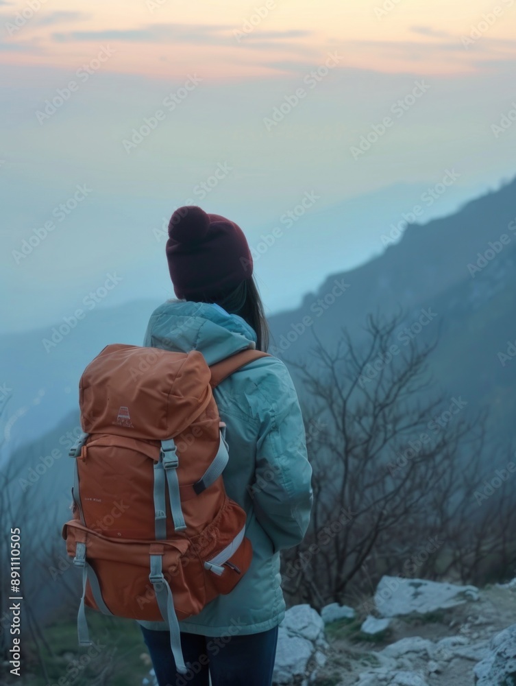 Woman Standing on Mountain with Backpack Woman Standing on Mountain with Backpack