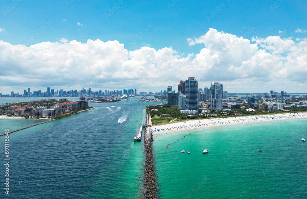 Aerial view of South Pointe Park. Miami Beach. Florida. USA. Weekend in Miami Beach. Aerial panoramic view of the city of Miami, buildings, marina, yachts and luxurious apartments. Aerial view of South Pointe Park. Miami Beach. Florida. USA. Weekend in Miami Beach. Aerial panoramic view of the city of Miami, buildings, marina, yachts and luxurious apartments.