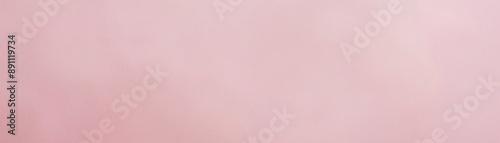 A plain pink background texture, providing a soft and soothing backdrop. The even color and subtle texture make it perfect for various design projects.