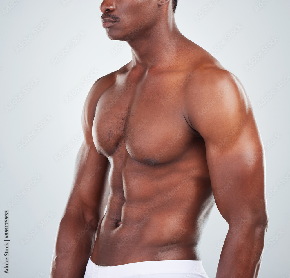 Fototapeta premium Studio, bodybuilder and torso of man in underwear with fitness progress, abs and body shape. Power, strength and male model with stomach muscle development, growth and self care on white background