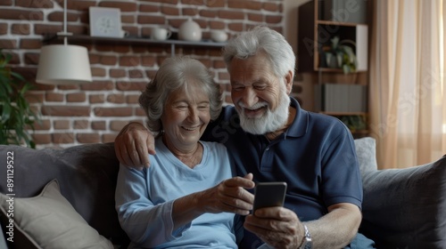 Elderly Couple Using Smartphone photo