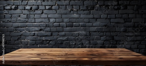 Wooden table with black brick wall background for product presentation, mockup or display banner template © Abdul
