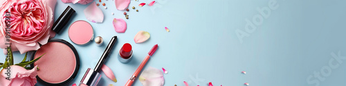 Makeup and cosmetics products set on pastel background with a copy space banner