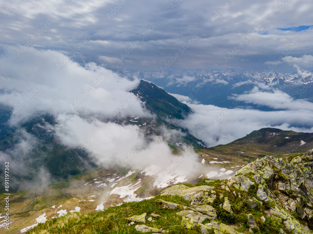 Ascending the Alpine Ridge: A Pathway Through the Clouds (Vorarlberg, Austria) Ascending the Alpine Ridge: A Pathway Through the Clouds (Vorarlberg, Austria)
