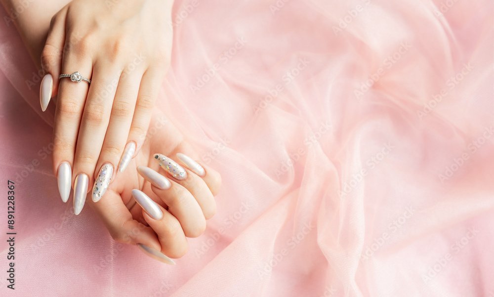 Female Hands with beautiful pearl manicure Female Hands with beautiful pearl manicure
