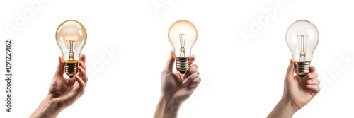 Hand Holding Classic Incandescent Light Bulb Set on Isolated Background photo